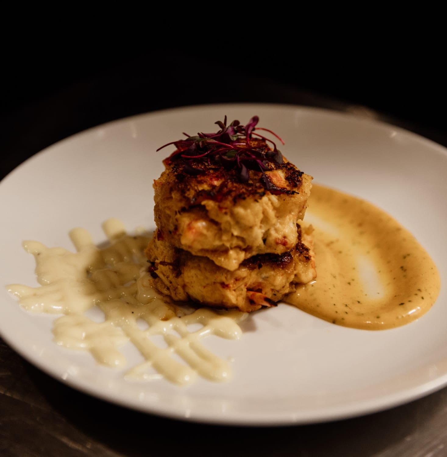 Lobster cakes served with aioli at CHR Steak
